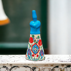 30cm quartz Whirling dervish figure with tulip and rose iznik floral pattern